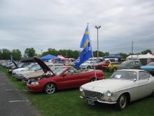 My 1999 Volvo C70 in the Volvo Show Field, Sporting the Swedish and Volvo flags